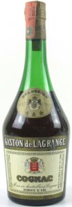 The label has adornments at the borders; 75cl, greenish shoulder label with the Royal appointment printed and greenish border around label; Italian import (1970s)