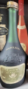 700ml and 40%vol indicated. Below the eagle reads: Cognac and Napoleon; green label