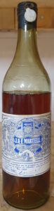 Shoulder label and Martell band most have fallen off; 72 centiltres and 42° indicated, with a metal duty seal: sigili Regno Fasci, in use from 1933-1944 (1940s)