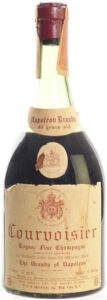 Napoleon brandy, fine champagne, 80 years old; with a paper shoulder emblem; 4/5 quart F-C-G Importers Inc New York (1960s)